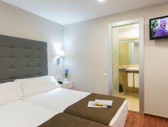 Chambre double avec cuisine
